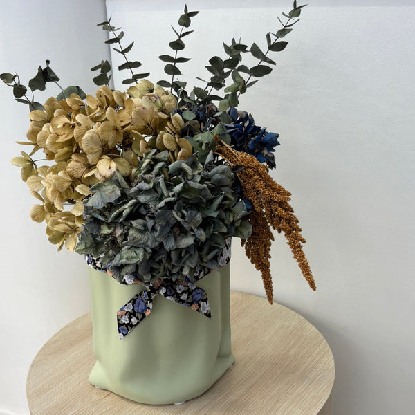 Dried Hydrangea, Eucalyptus & Amaranthus Arrangement in Ceramic Bag Vase