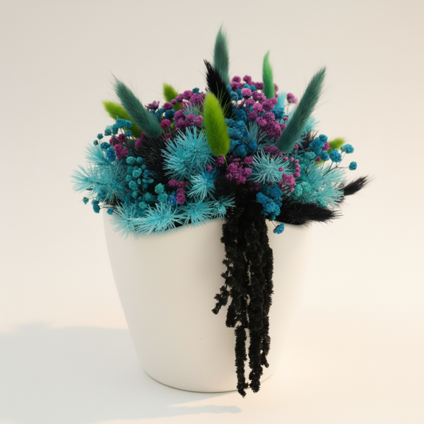 Midnight Bloom low dried flower arrangement in white ceramic pot featuring teal ming fern, purple and blue gypsophila, and black botanicals — About You Orewa NZ